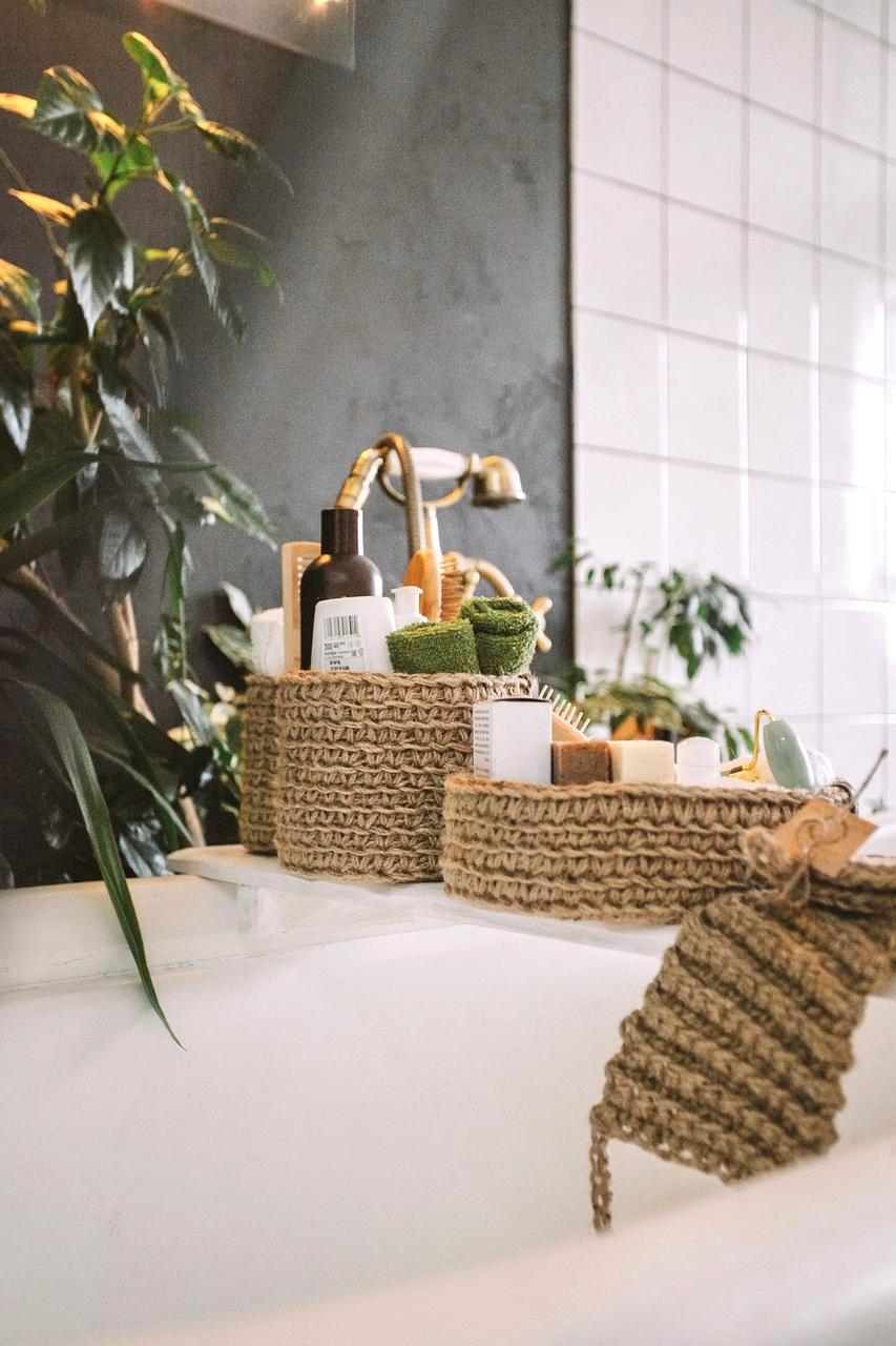 Bathroom shelves with labeled storage baskets and toiletries