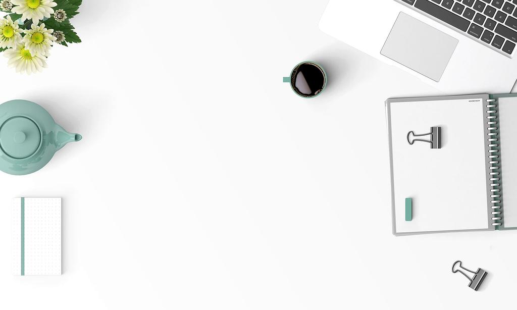 Stack of organized notebooks and a pen on wooden table